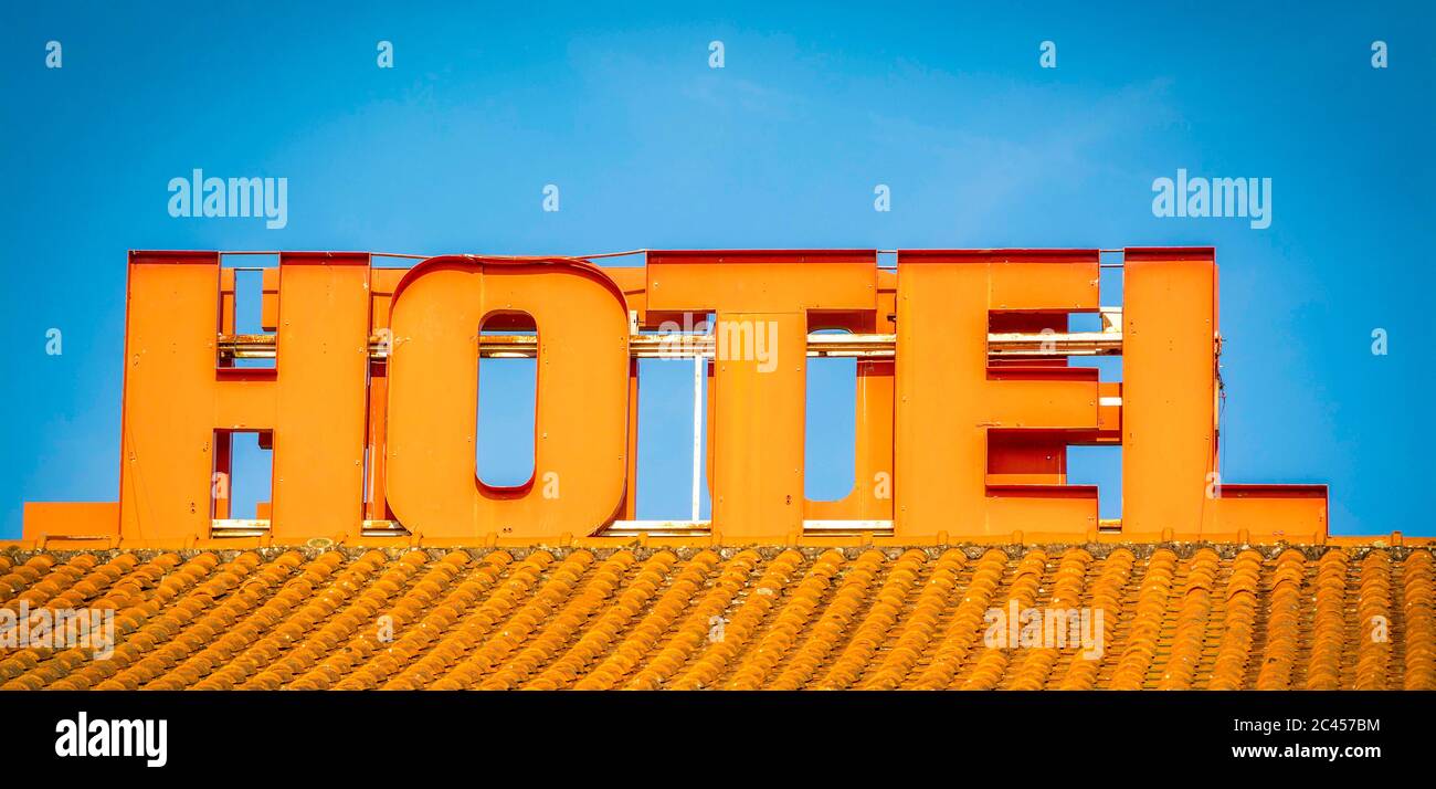 Orange hotel sign Stock Photo