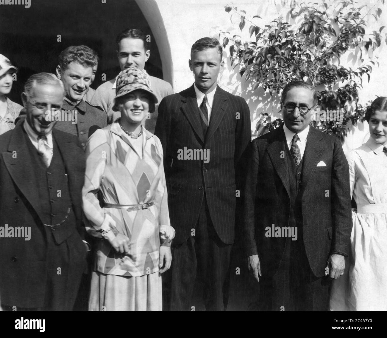 Colonel CHARLES LINDBERGH (centre) visits MGM Studios in Hollywood 1927 surrounded by producer HARRY RAPF RALPH FORBES MARION DAVIES WILLIAM HAINES LOUIS B. MAYER and MARCELLINE DAY Metro Goldwyn Mayer Publicity Stock Photo