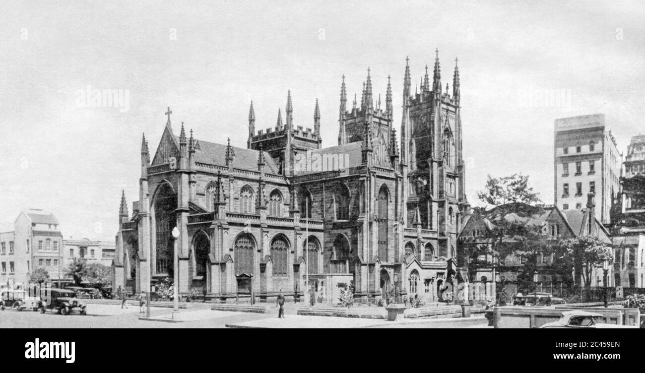 Crowded these days by surrounding roads, mature trees and buildings, St Andrew's Anglican Cathedral, is a cathedral church of the Anglican Diocese of Sydney in the Anglican Church of Australia. Designed by Architect Edmund Blacket the building was constructed between 1837 and 1868 in a Gothic Revival style. This image was published in a 1938 book by Municipal Council of Sydney to commemorate 'the 150th anniversary of the founding of a nation (Australia)' Stock Photo