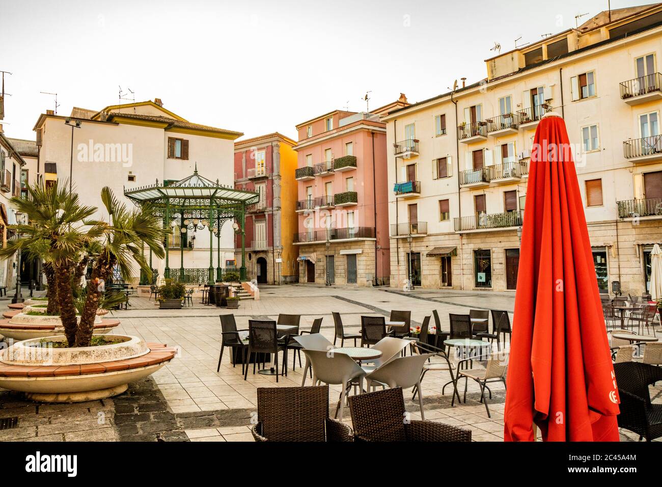 October 27, 2019 - Isernia, Molise, Italy - The deserted square in the city center. The empty tables of bars and restaurants in the evening. The Liber Stock Photo