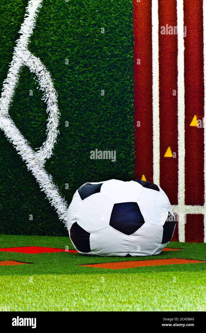 Indoor sport carpets with puff soccer ball Stock Photo Alamy
