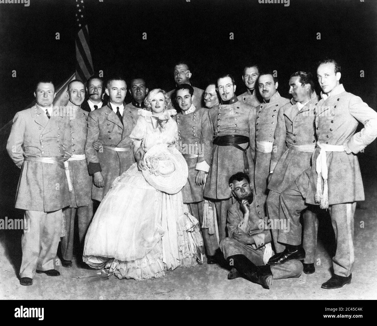 MARION DAVIES and IRVING G. THALBERG at wrap party following completion of OPERATOR 13 director RICHARD BOLESLAWSKI (third from left) Metro Goldwyn Mayer Stock Photo