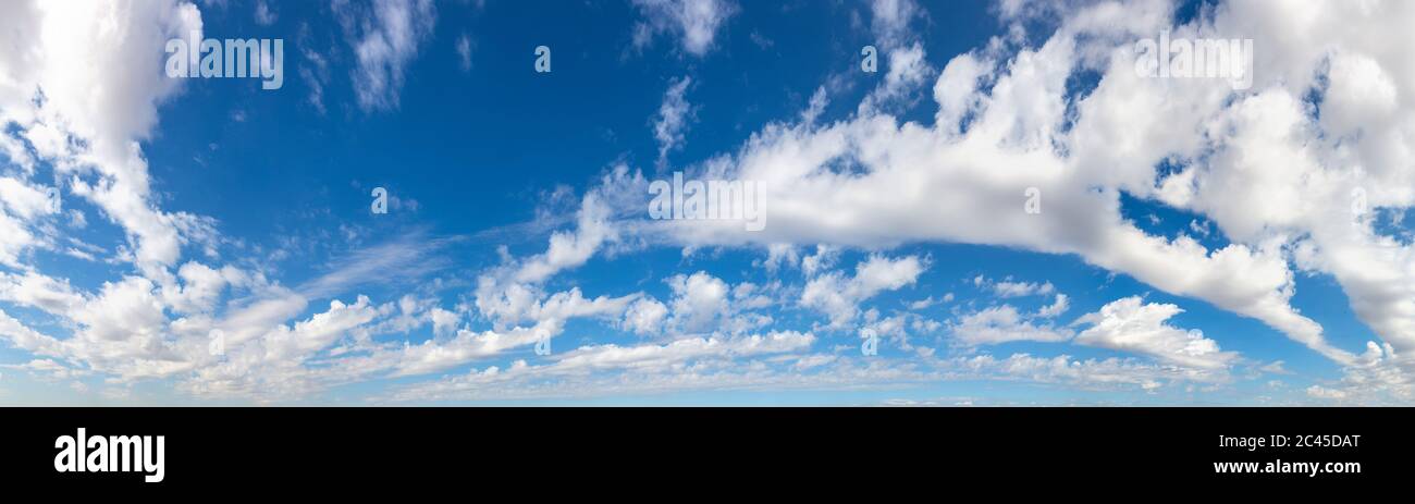 Blue sky with white clouds in a beautiful summer day Stock Photo - Alamy