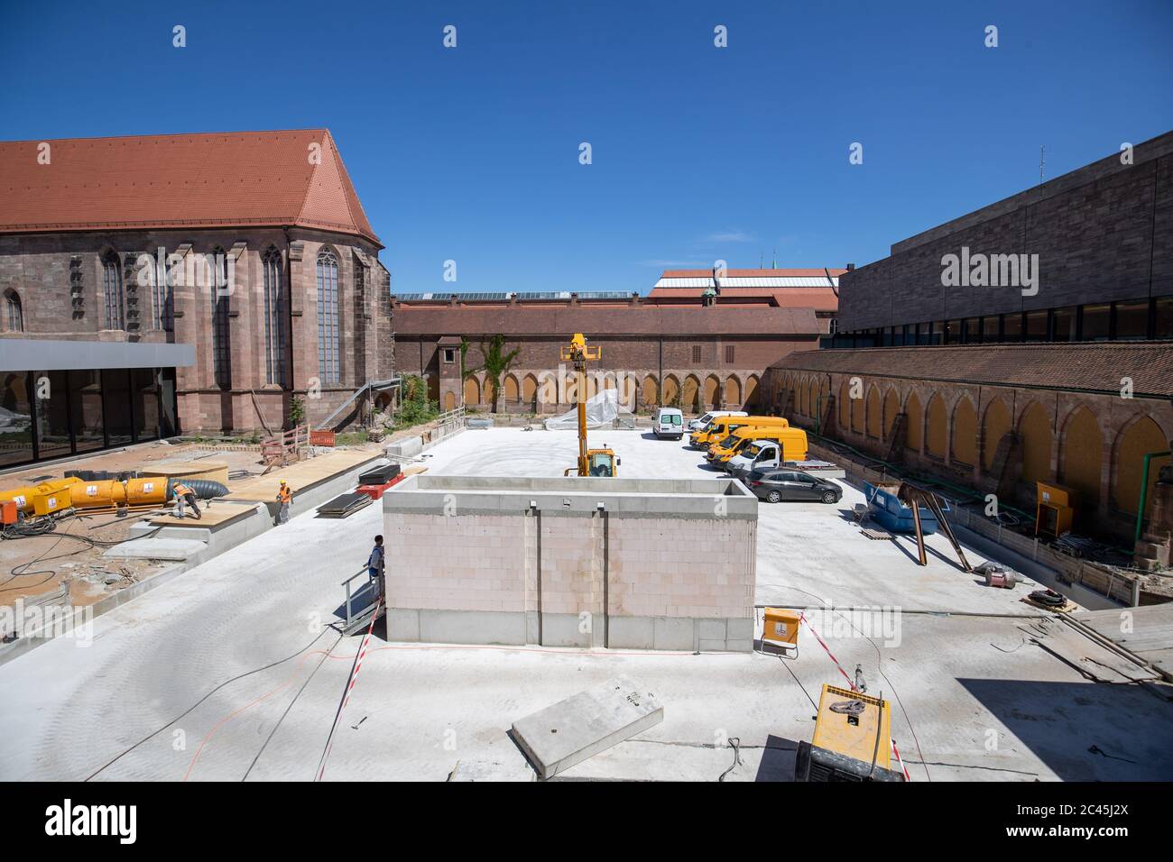 Nuremberg, Germany. 24th June, 2020. Exterior view between the existing buildings of the Germanisches Nationalmuseum of the new underground depot. The depot is located five floors deep underground, is 3700 square meters in size, and according to the museum is unique in Germany. The first objects are expected to move in in the summer of 2021. Credit: Daniel Karmann/dpa/Alamy Live News Stock Photo