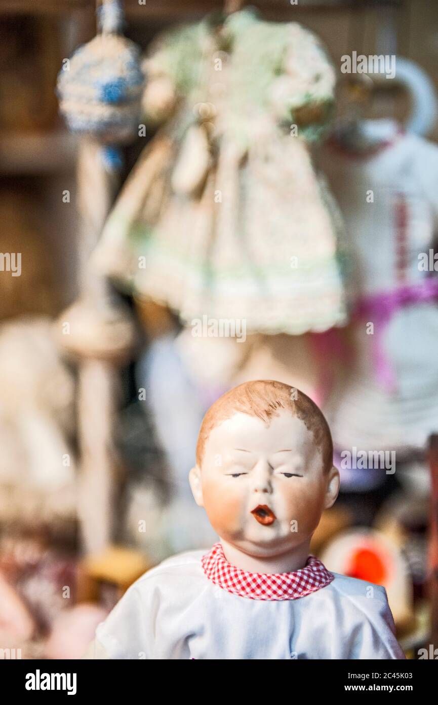 Old fashioned doll in a doll repair shop, Dresden, Saxony, Germany Stock Photo
