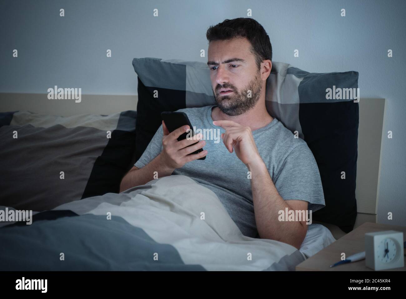 Mobile gadget dependence. Man bearded hipster play smartphone while  girlfriend relaxing near. Internet surfing and social networks. Mobile  internet addiction. Husband addicted internet online games Stock Photo -  Alamy