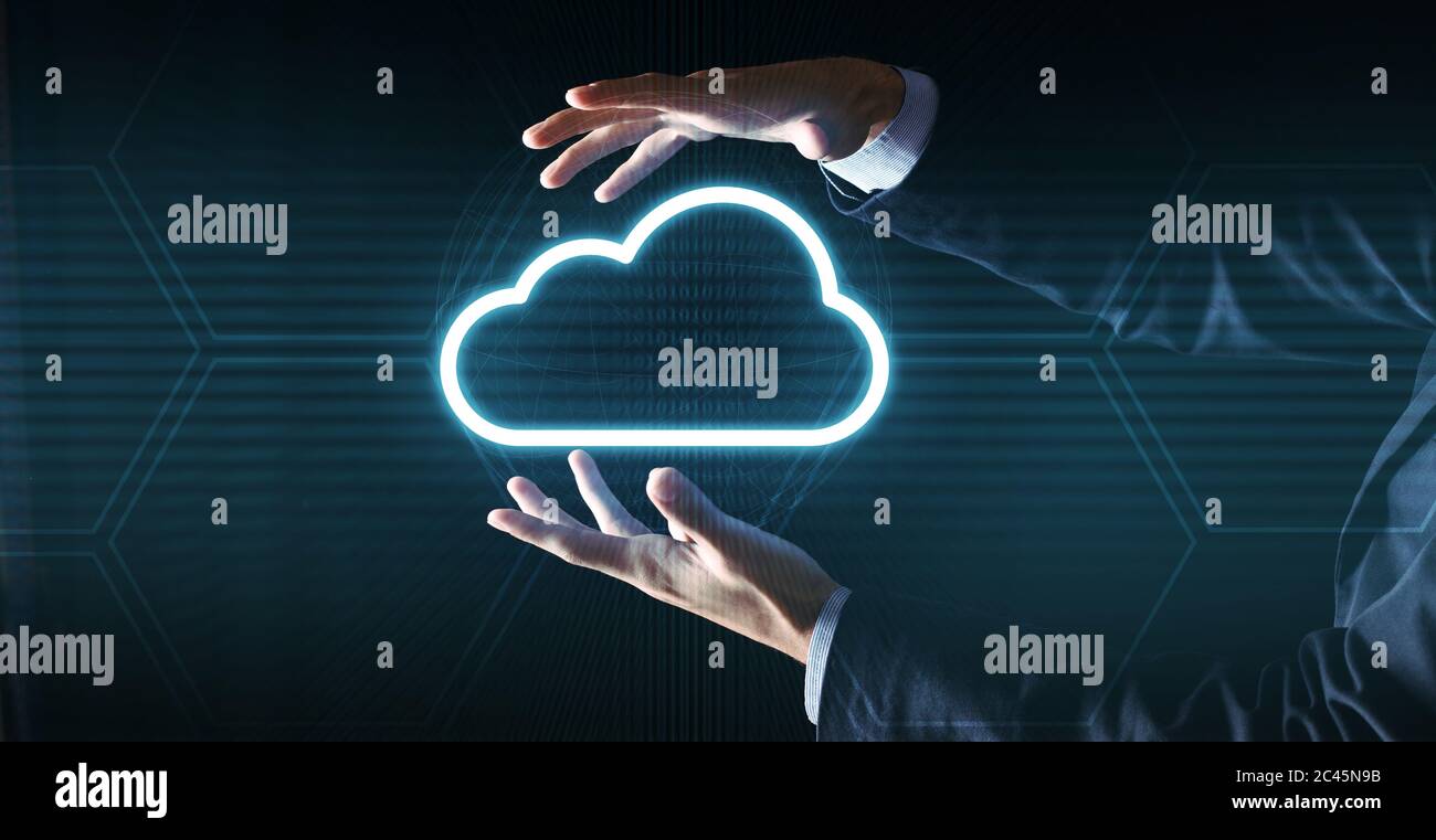 Cloud computing concept. Unrecognizable businessman in suit holding cloud icon projection Stock Photo