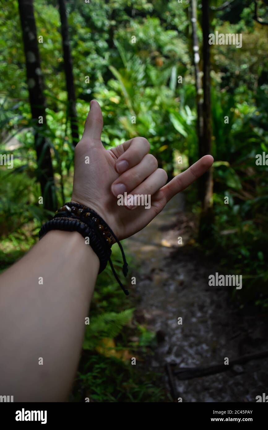 Showing calling gesture hi-res stock photography and images - Alamy