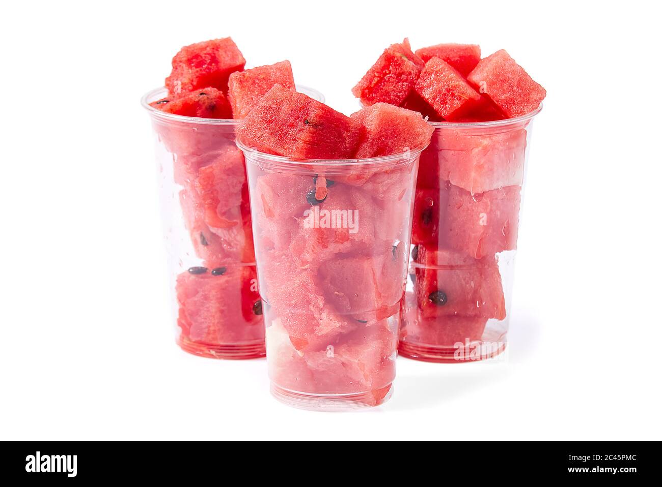 Close Up Sliced Red Watermelon Cubes In Plastic Cup Isolated On White Stock Photo Alamy