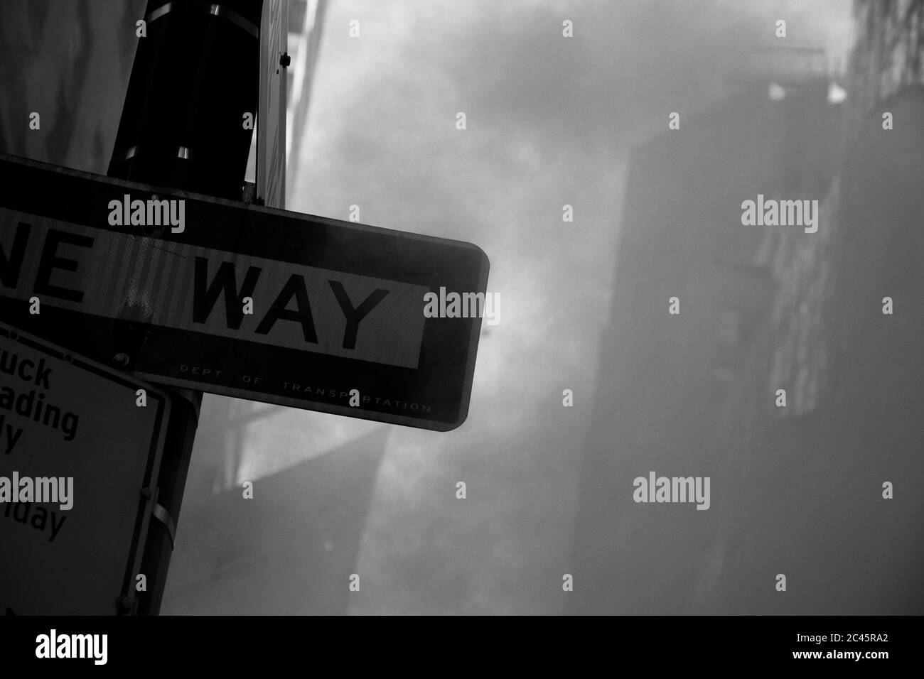 One way stop sign Black and White Stock Photos & Images - Alamy
