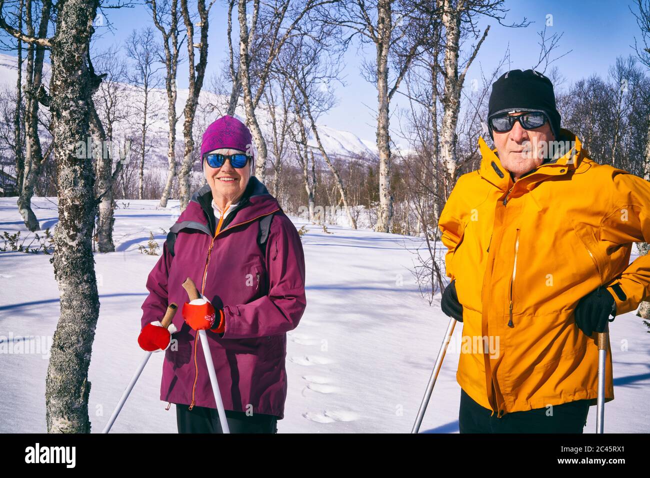 Couple cross-country skiing in Vasterbottens Lan, Sweden. Stock Photo