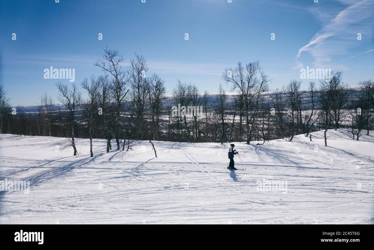 Young boy cross-country skiing in Vasterbottens Lan, Sweden. Stock Photo