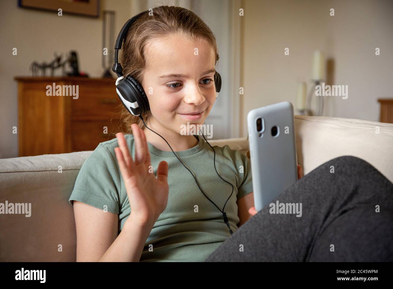 Pre teen girl sofa hi-res stock photography and images - Alamy