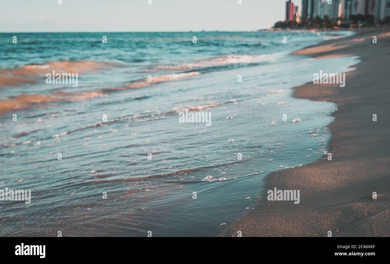 Beautiful scenery of the sea waves splashing on the beach in Ondas ...