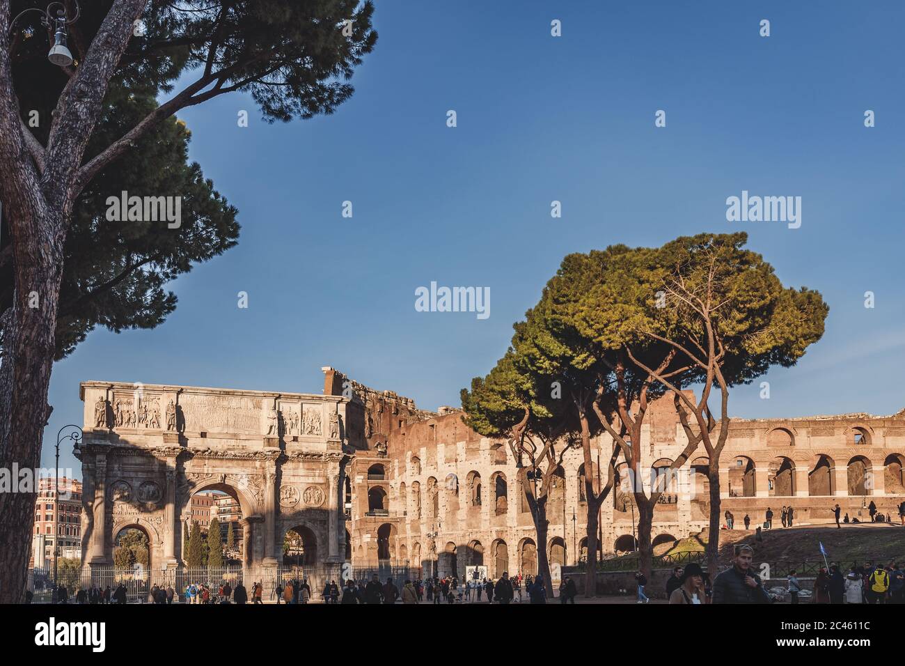 Triumphal arch Rome – Arco di Costantino with Colosseum Stock Photo