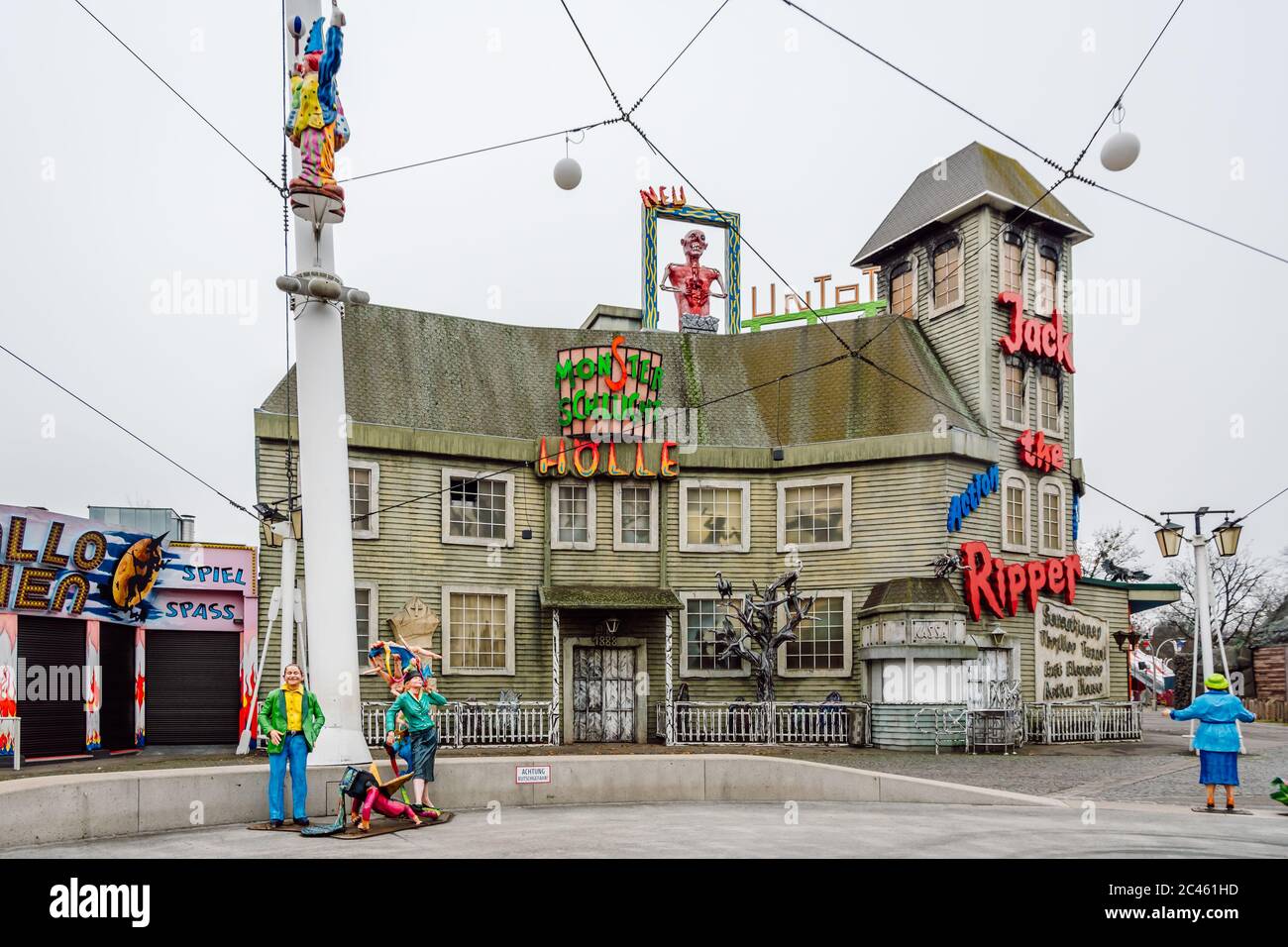 Jack the Ripper and the house of horror, theme house in Prater park, Vienna. Colorful figures of people in front of the house of horrors. Stock Photo