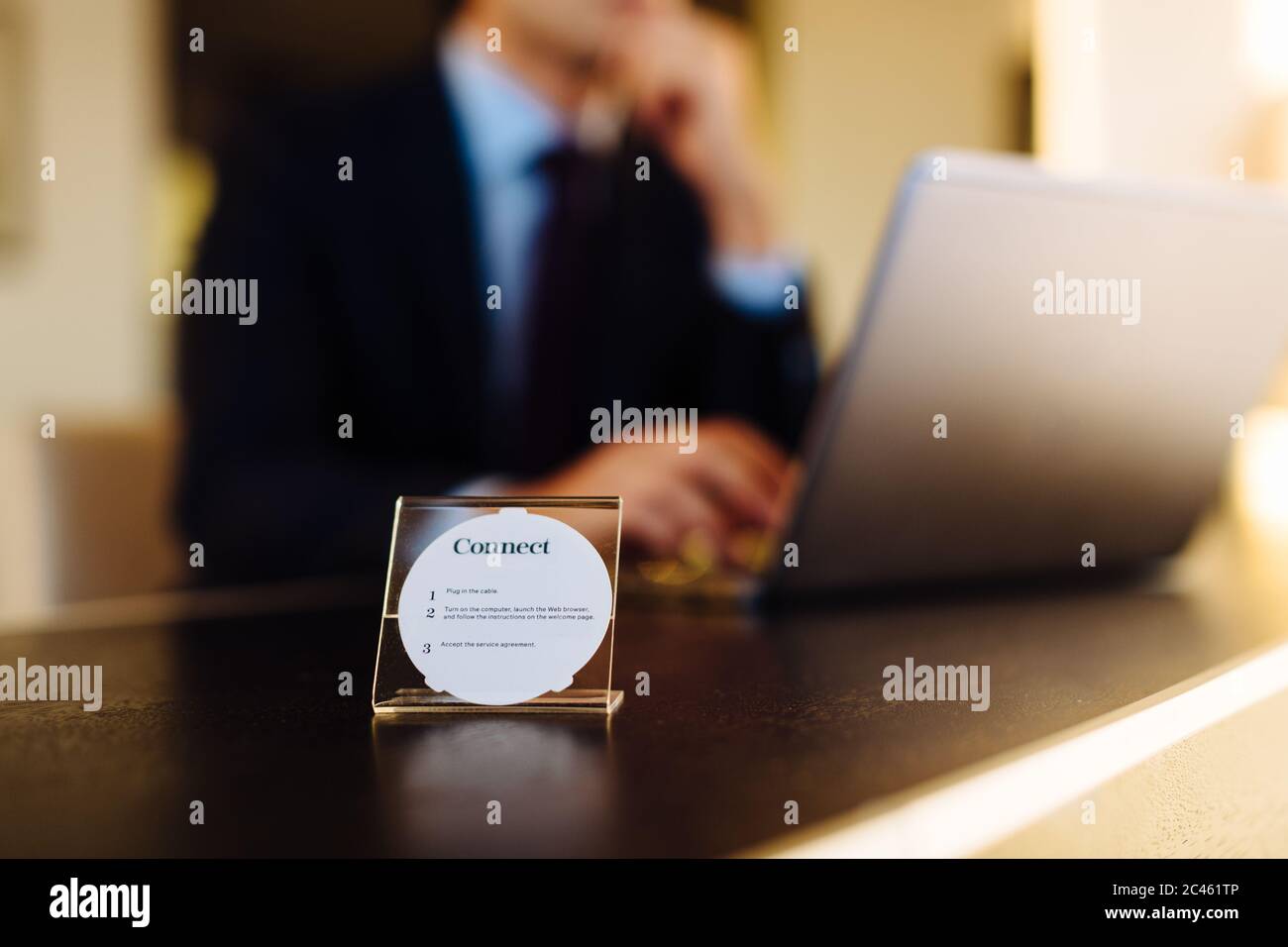 Businessman working in business centre in hotel Stock Photo