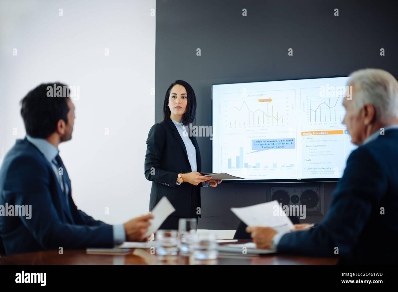 Two businessmen meeting at boardroom presentation Stock Photo