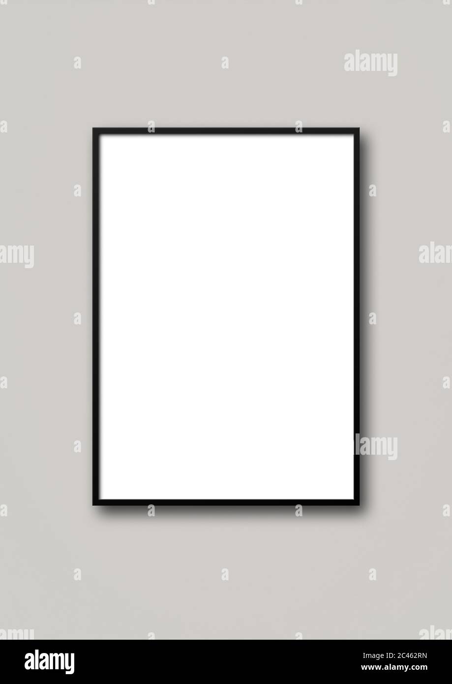 Black picture frame hanging on a light grey wall. Blank mockup template ...