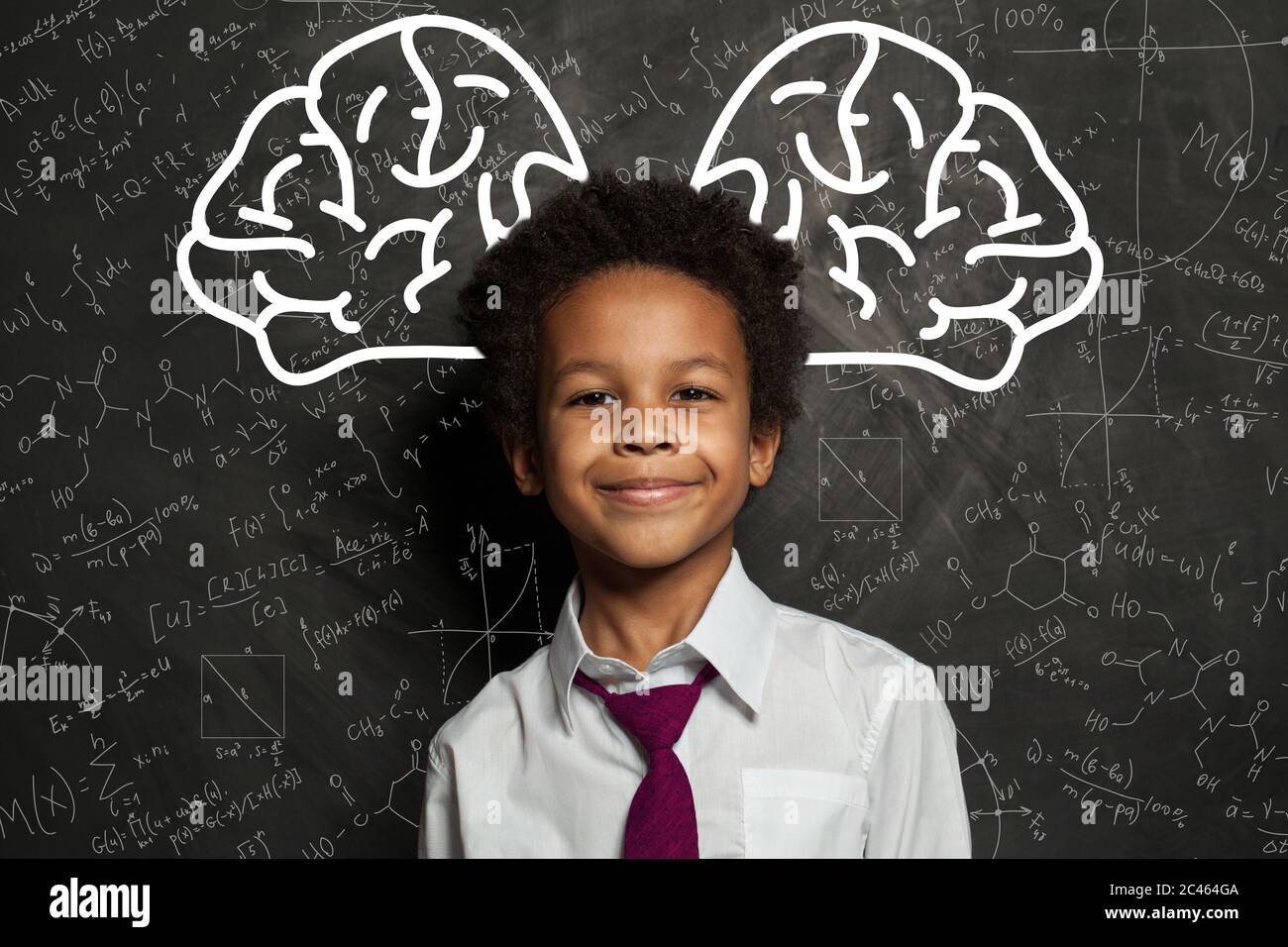 Clever child. Little school boy student on chalkboard background with