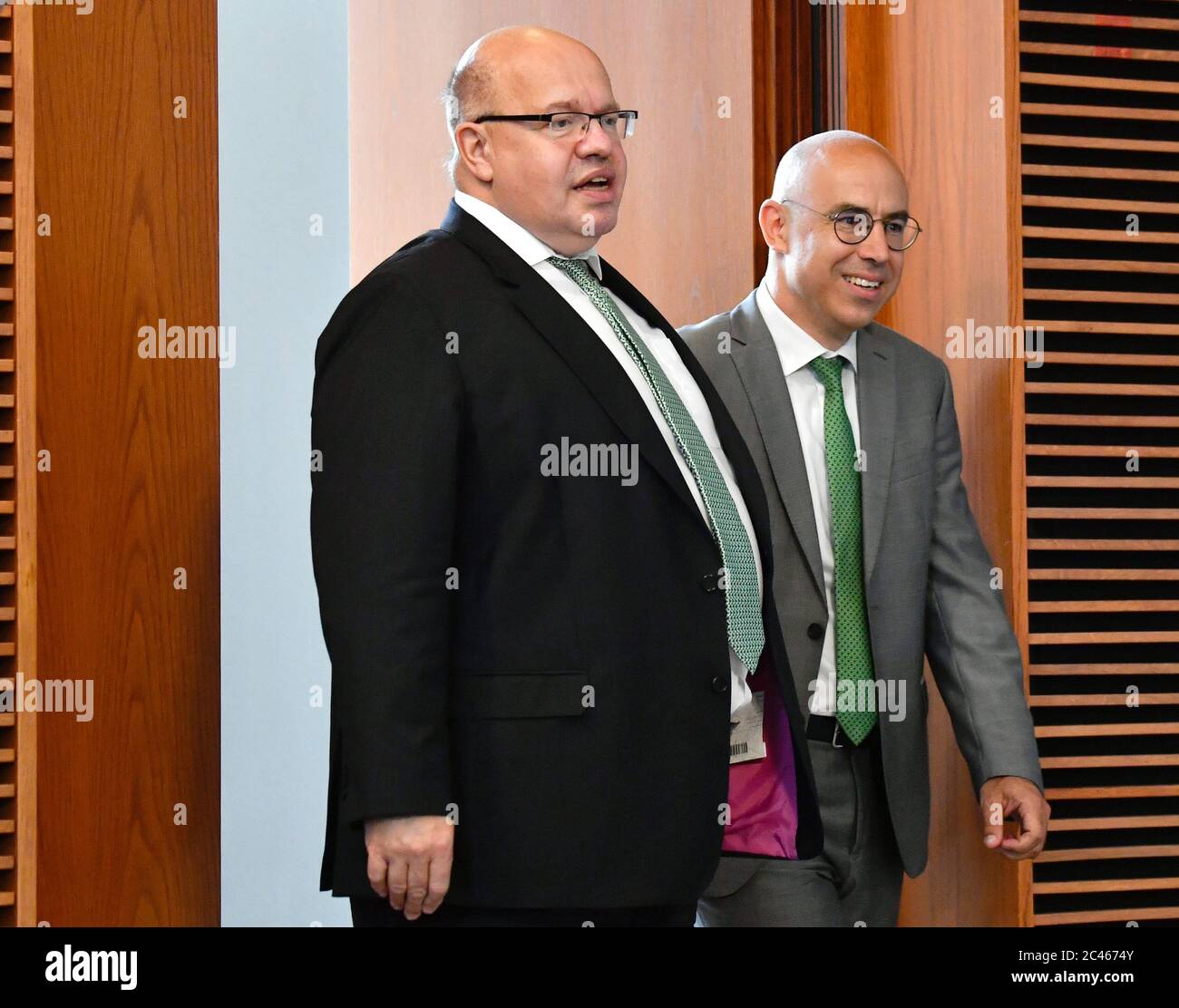 Berlin, Germany. 24th June, 2020. Federal Minister of Economics Peter Altmaier (CDU, l) and the President of the Kiel Institute for the World Economy (Ifw), Gabriel Felbermayr, come to a press conference on the occasion of the Location Conference 2020 on the situation of industry in Germany. Credit: John Macdougall/AFP Pool/dpa/Alamy Live News Stock Photo