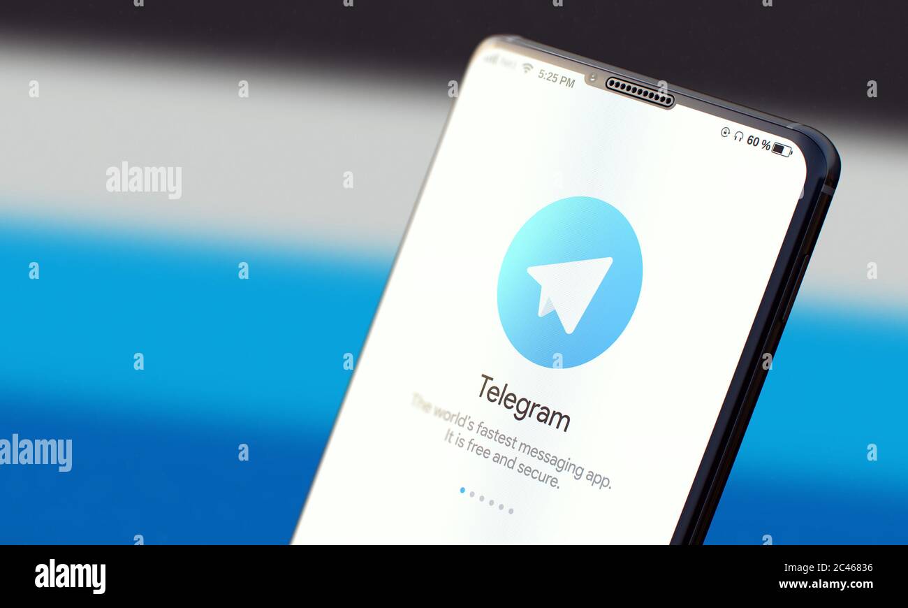 KYIV, UKRAINE-JUNE, 2020: Telegram. Studio Shot of Cellphone with Telegram Mobile Application on Blurred Back. Stock Photo