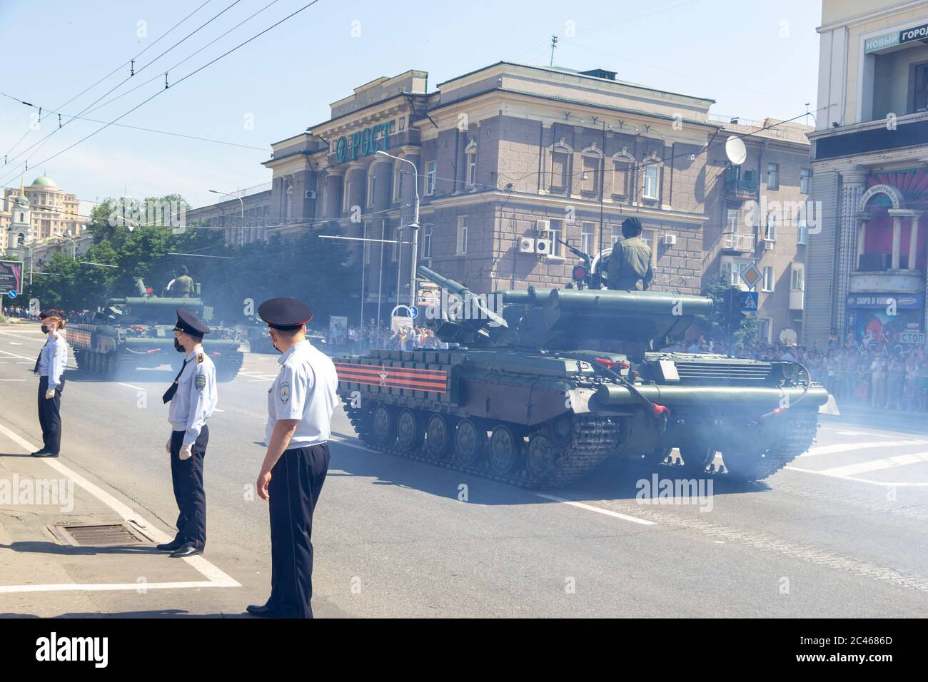 Donetsk, Donetsk People Republic, Ukraine - June 24, 2020: Armored heavy Soviet tanks move along the main street of the city during the Victory Parade Stock Photo