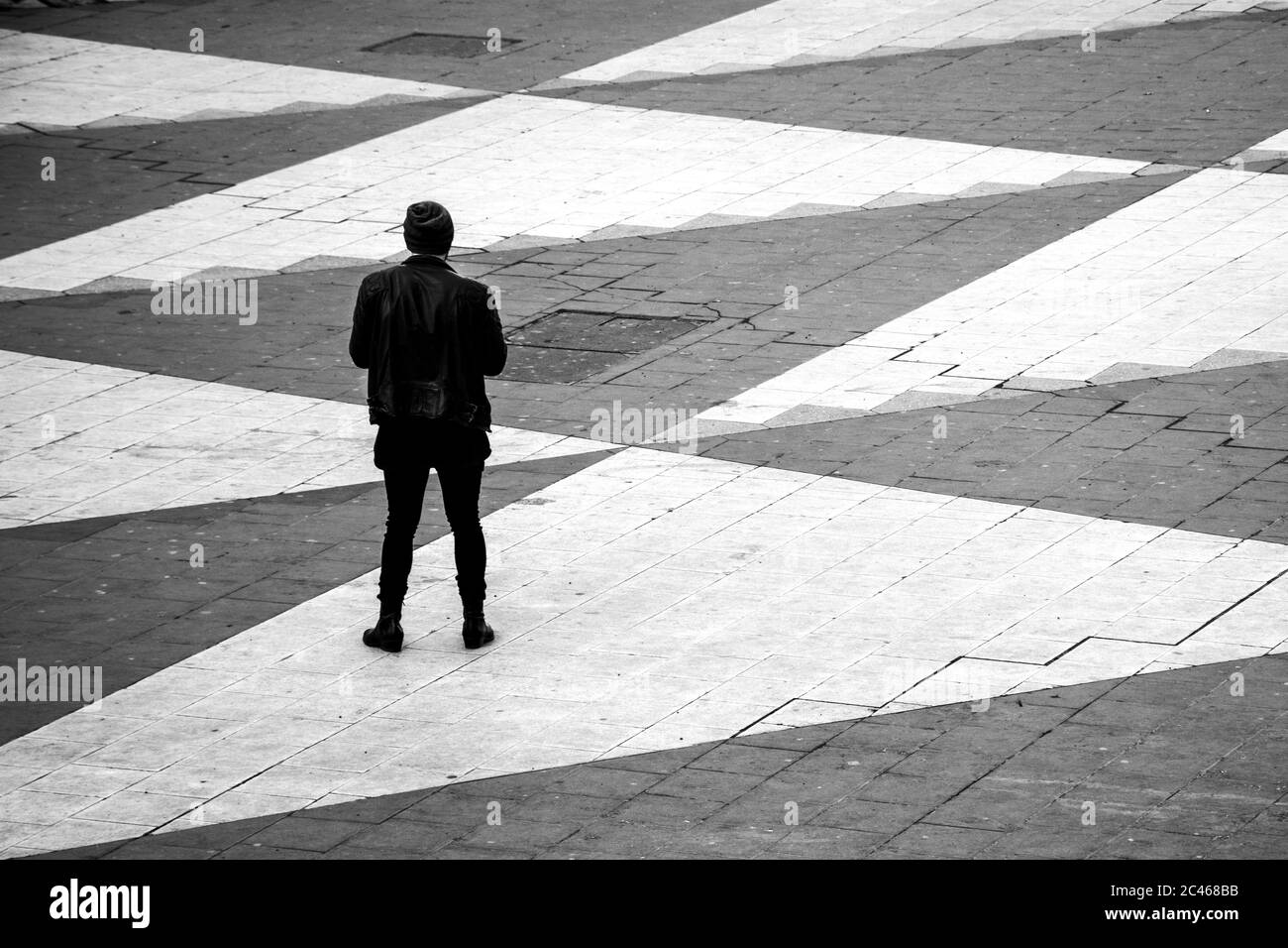 Sad man white background standing Black and White Stock Photos & Images ...