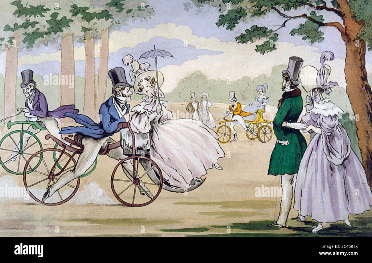 BICYCLE Early forms called Draisienne or 'dandy horse' had no pedals and were pushed along with the feet. Stock Photo