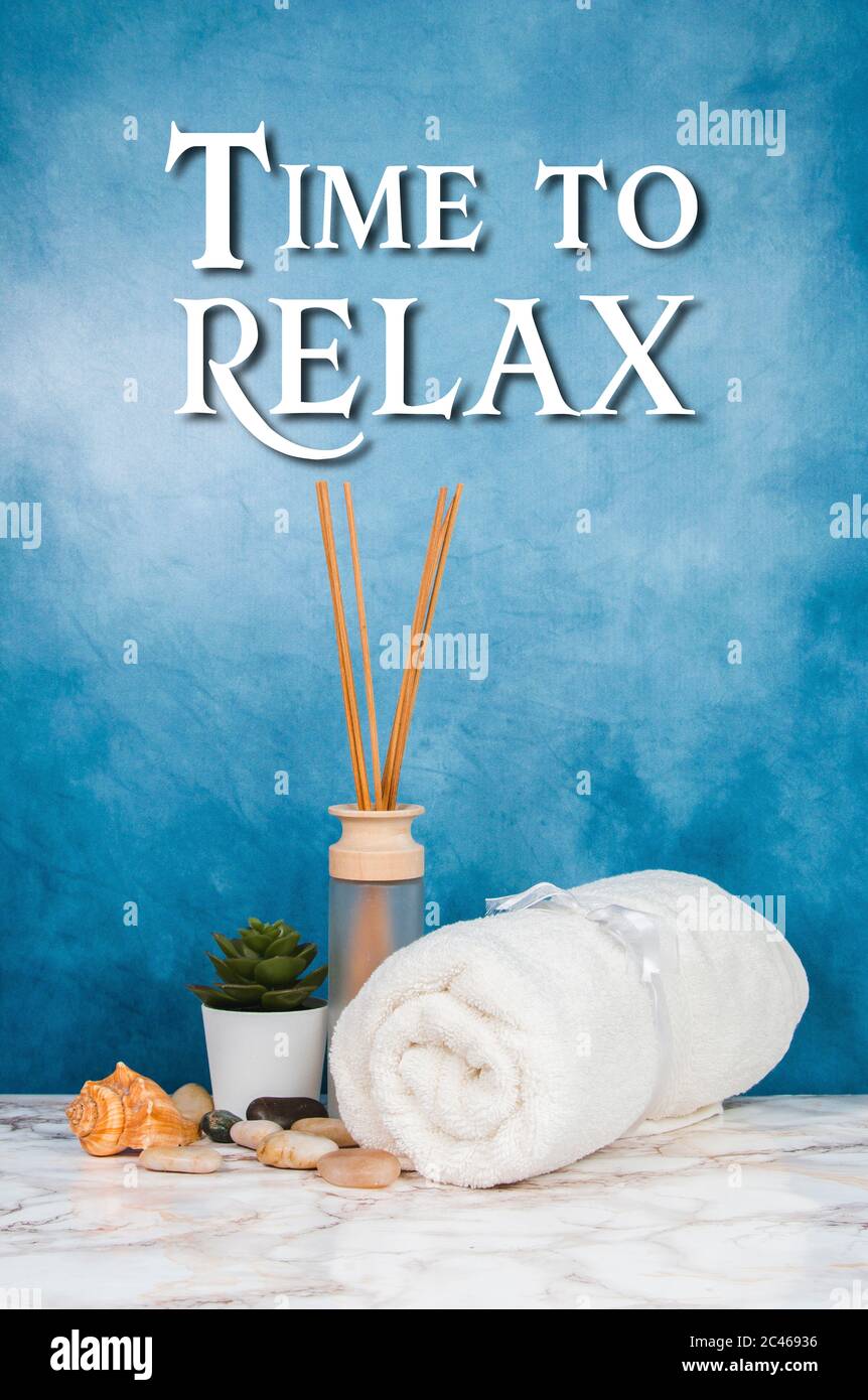 Spa objects and elements on a marble table and blue background Stock Photo