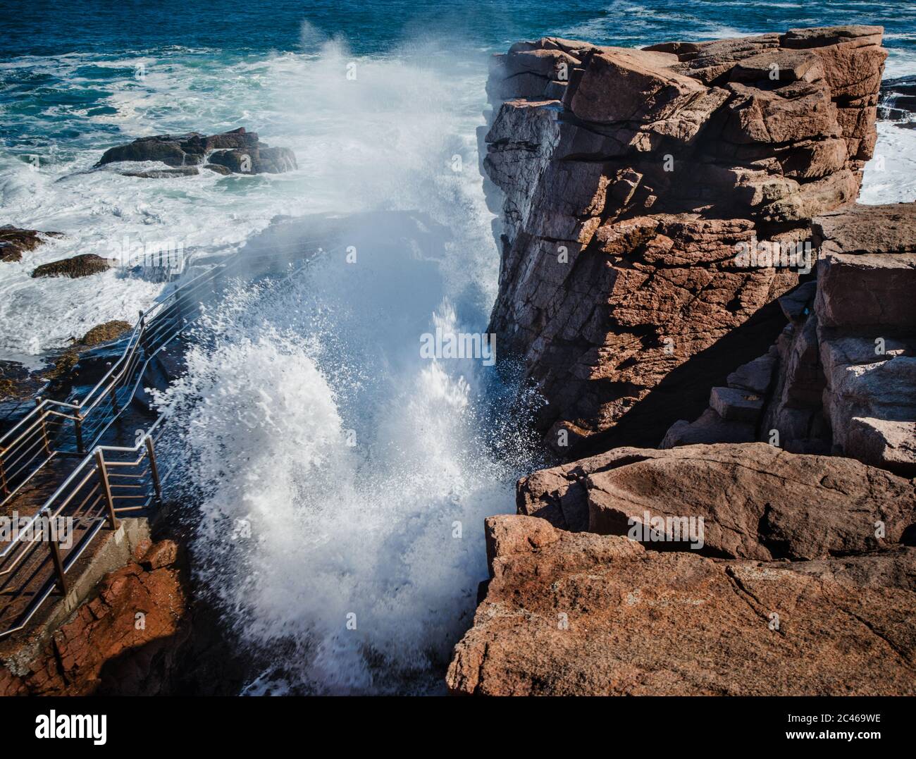 Thunder Hole, a small inlet, naturally carved out of the rocks, where the waves roll into, Acadia National Park, Maine, United States, North America Stock Photo