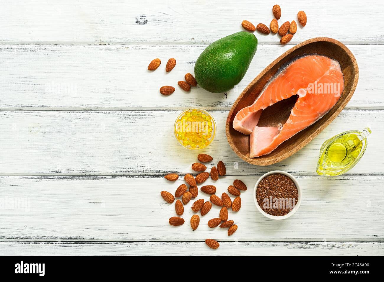Food high in omega3 fatty acids on a white wooden background. Healthy