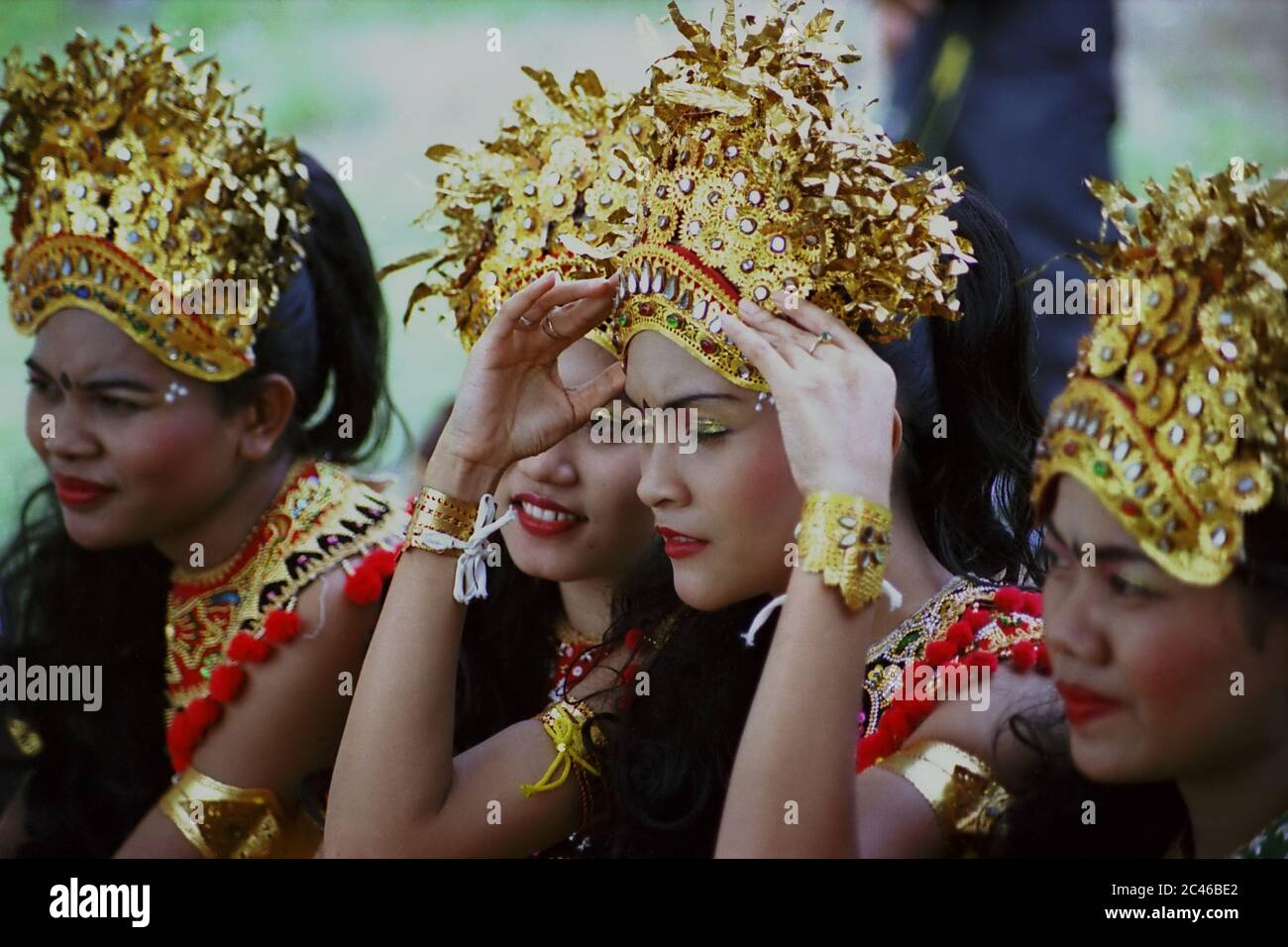 Indonesian traditional dancers grouping as they wait for stage performance during the 2004 Jakarta Highland Gathering in Karawaci, Banten, Indonesia. Archival photo. Stock Photo