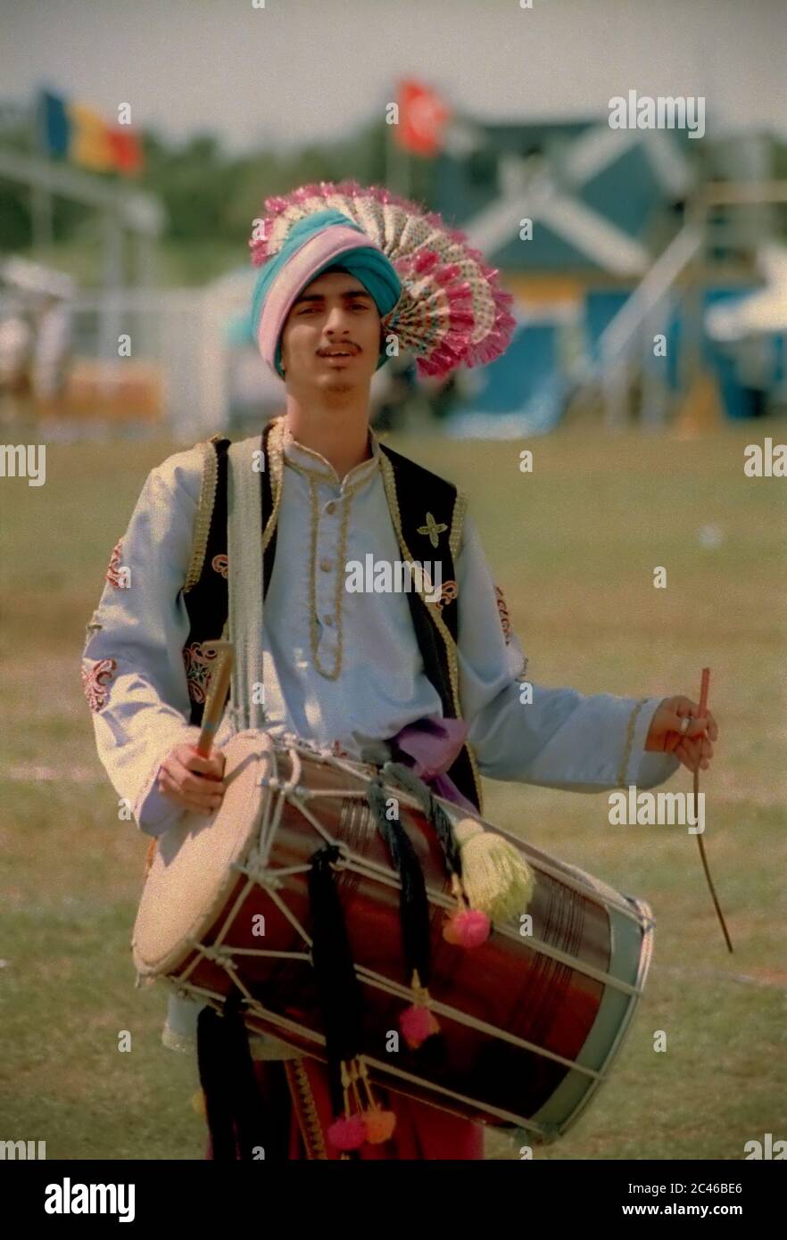 Man playing chenda percussion from India during the 2004 Jakarta Highland Gathering in Karawaci, Indonesia. Stock Photo