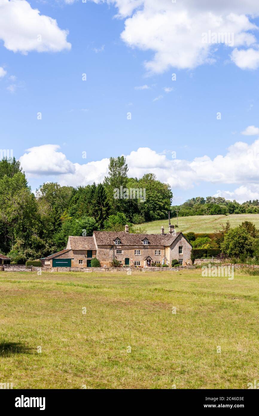 The Coln Valley - looking across to Yanworth Mill beside the River Coln near the Cotswold village of Yanworth, Gloucestershire UK Stock Photo