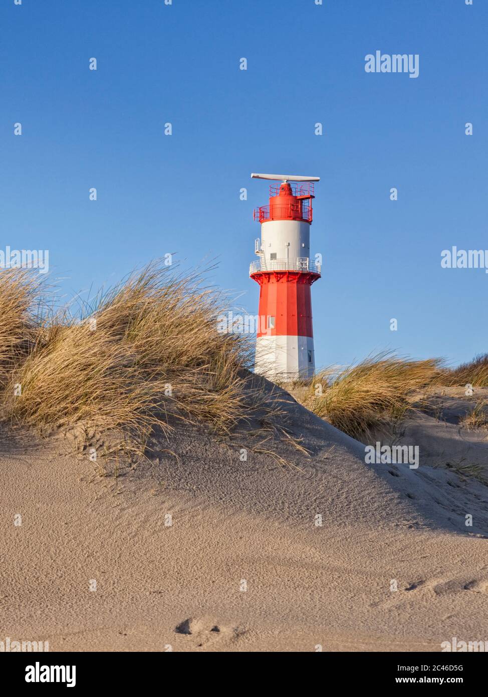 Dunes and small lighthouse at south beach of Borkum island Stock Photo