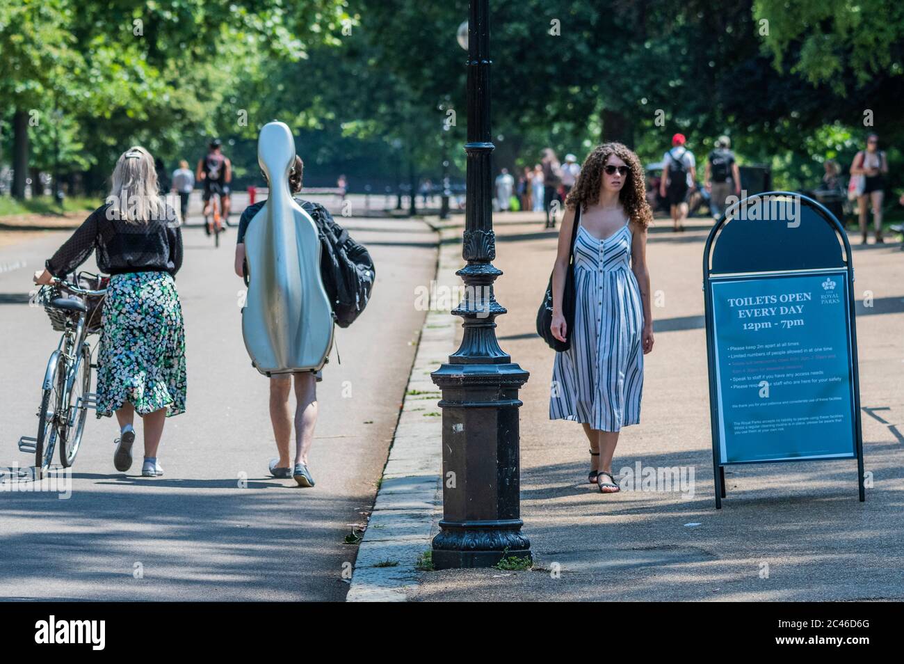 London, UK. 24th June, 2020. Relief as the toilets re-open - The Hottest day of the Year so far in Hyde Park as the Coronavirus Lockdown continues to ease. Credit: Guy Bell/Alamy Live News Stock Photo