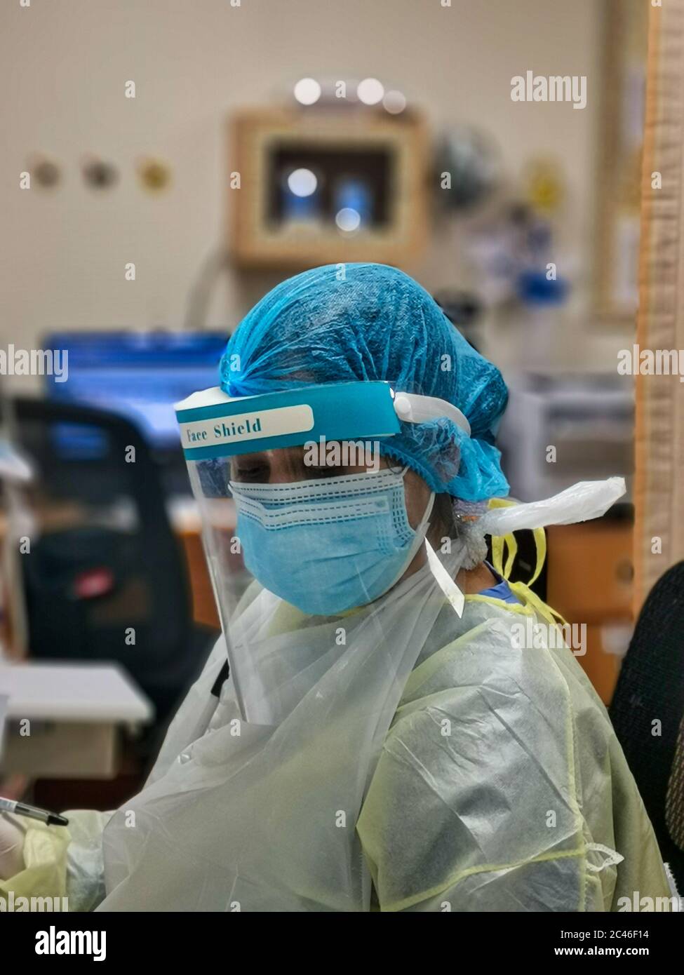 Female nurse wearing Personal protective equipment (PPE) in the hospital to fight against Corona virus disease (COVID-19) Stock Photo