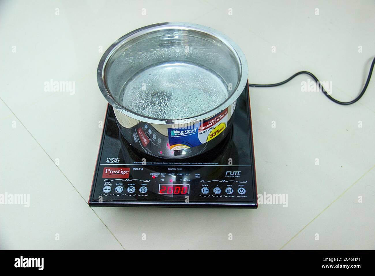 Steaming Pot Of Boiling Water On Red Hot Electric Stove Burner