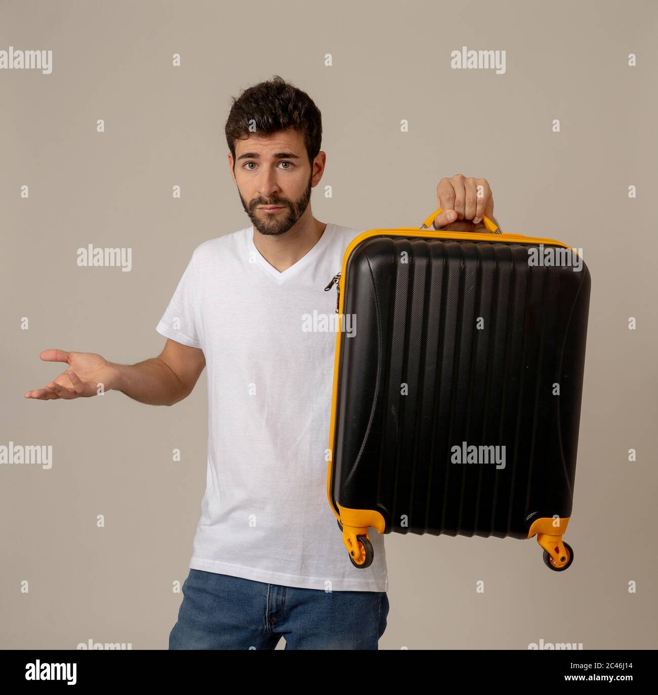 https://c8.alamy.com/comp/2C46J14/attractive-young-traveler-man-showing-suitcase-isolated-on-neutral-background-advertising-style-image-for-storage-space-for-travelers-tourism-and-tr-2C46J14.jpg