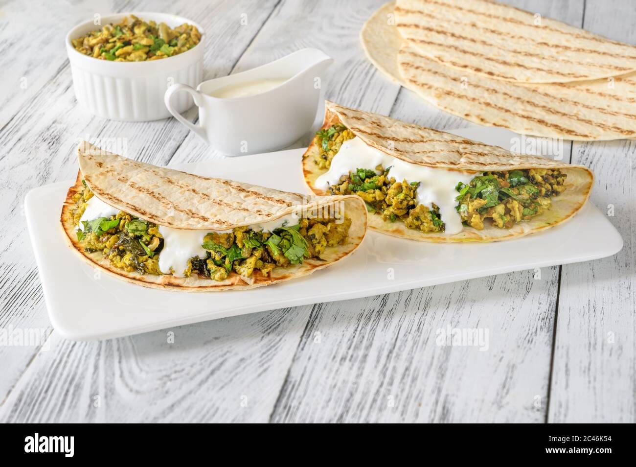 indian-spicy-egg-and-spinach-wraps-stock-photo-alamy