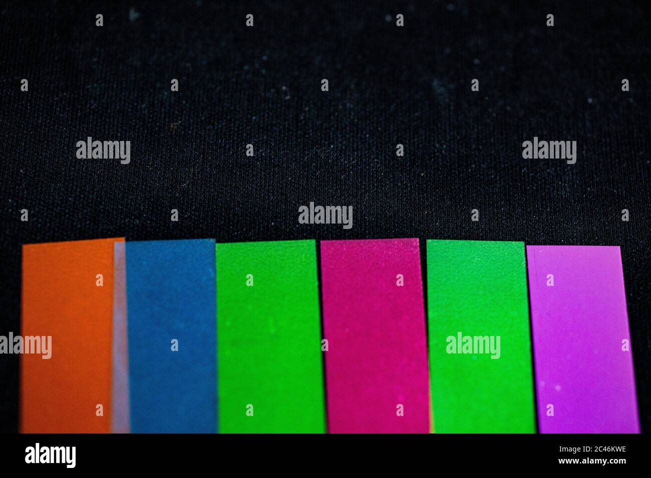 Closeup shot of color bars on a black background Stock Photo - Alamy