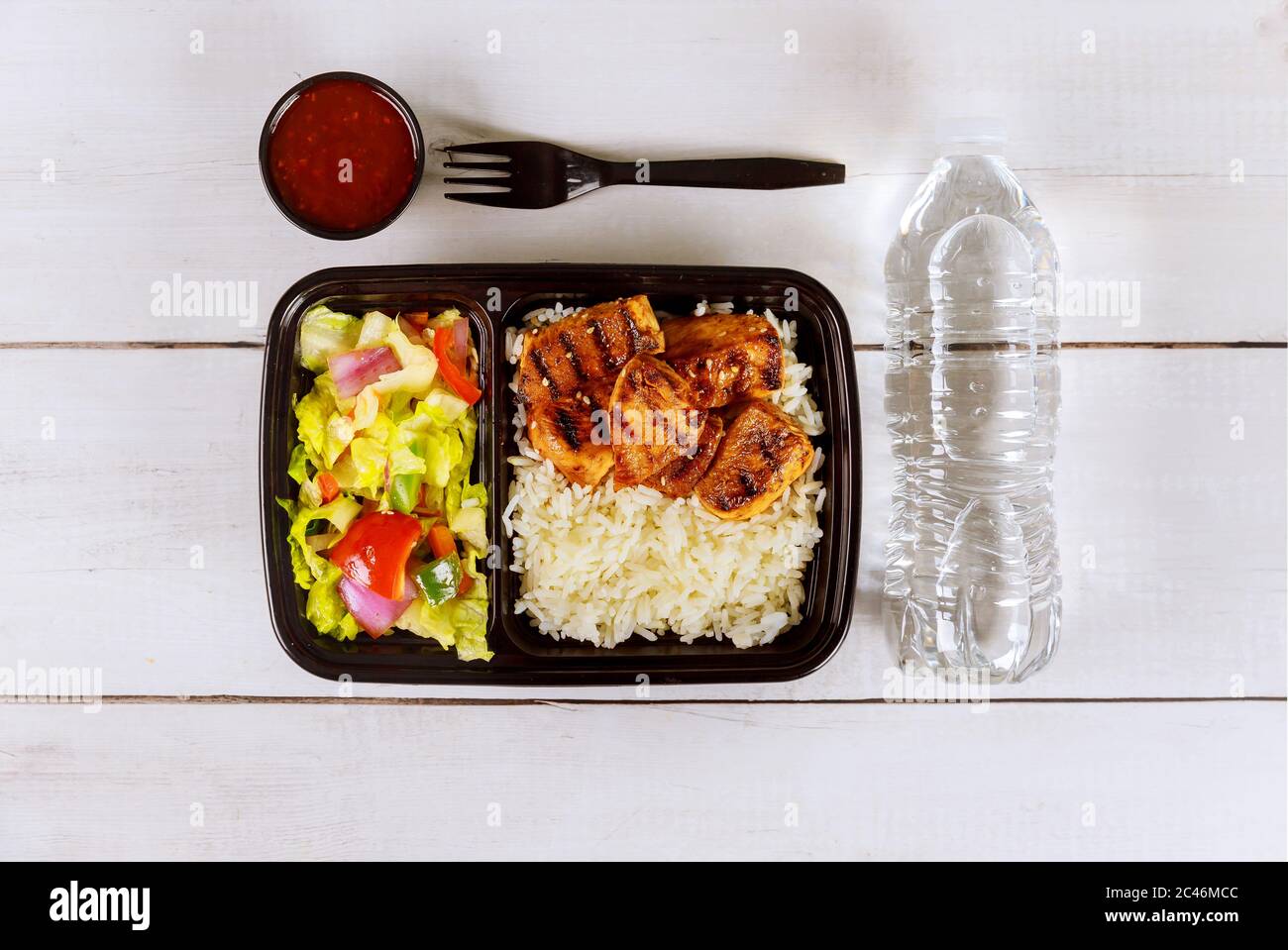 Healthy food delivery or take away lunch in plastic tray Stock Photo