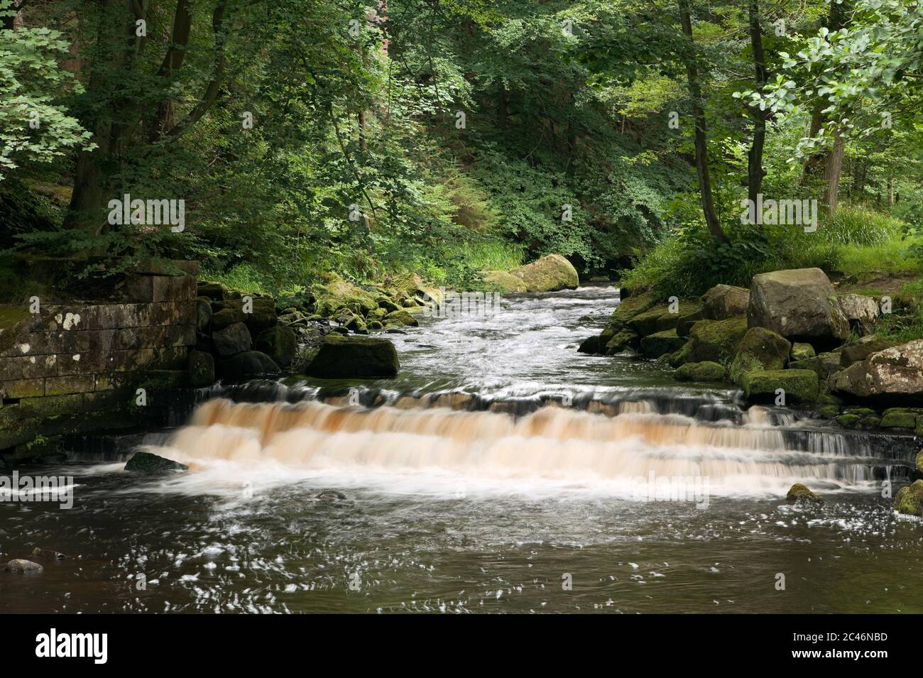 Weir in the River Washburn, Yorkshire, UK Stock Photo