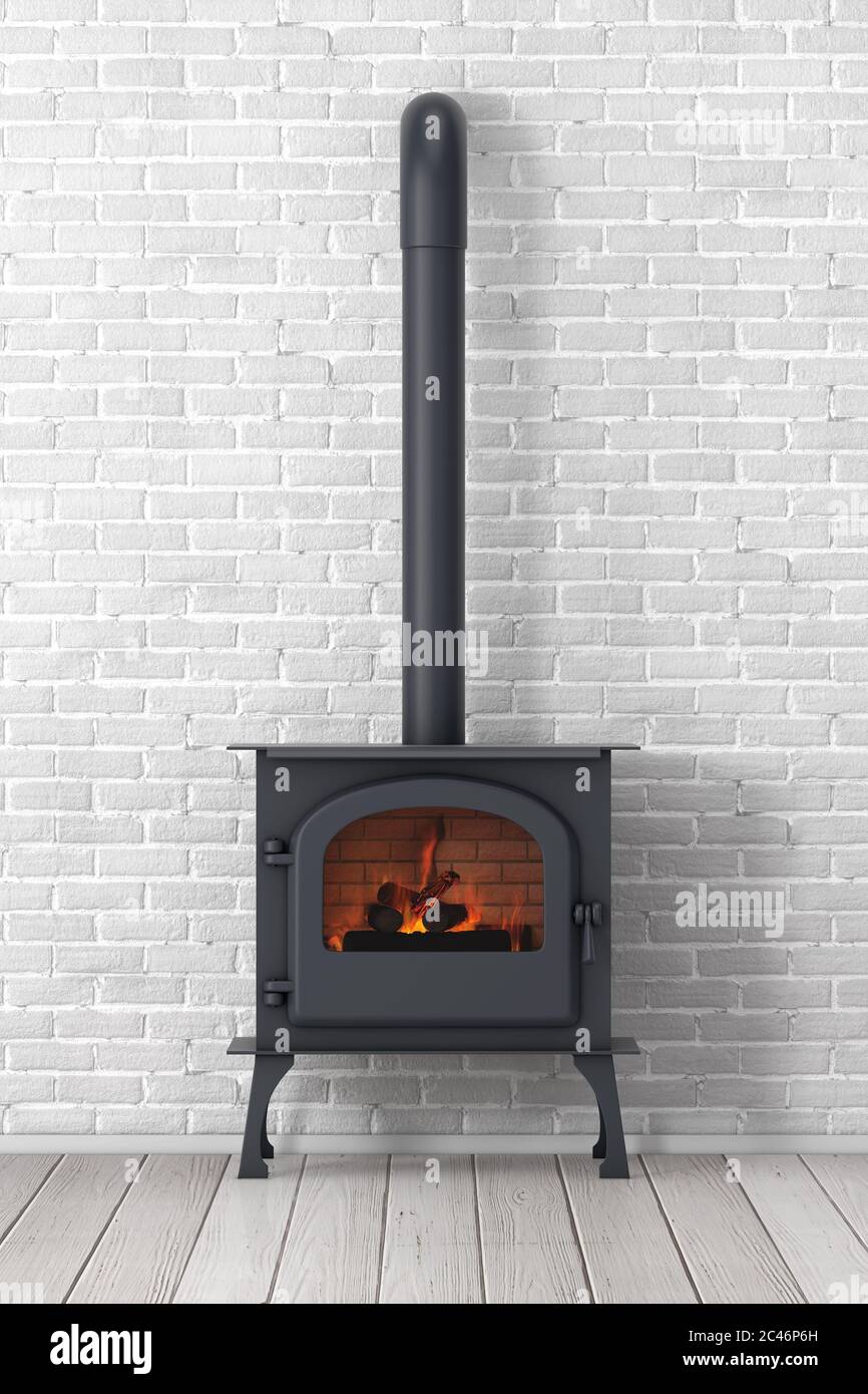 COSY decorating letters against a rustic brick wall above a wood burning  stove Stock Photo - Alamy