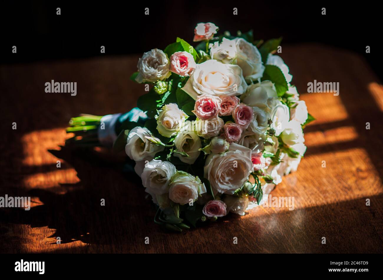 Colorfull bouquet of roses lying on the table Stock Photo