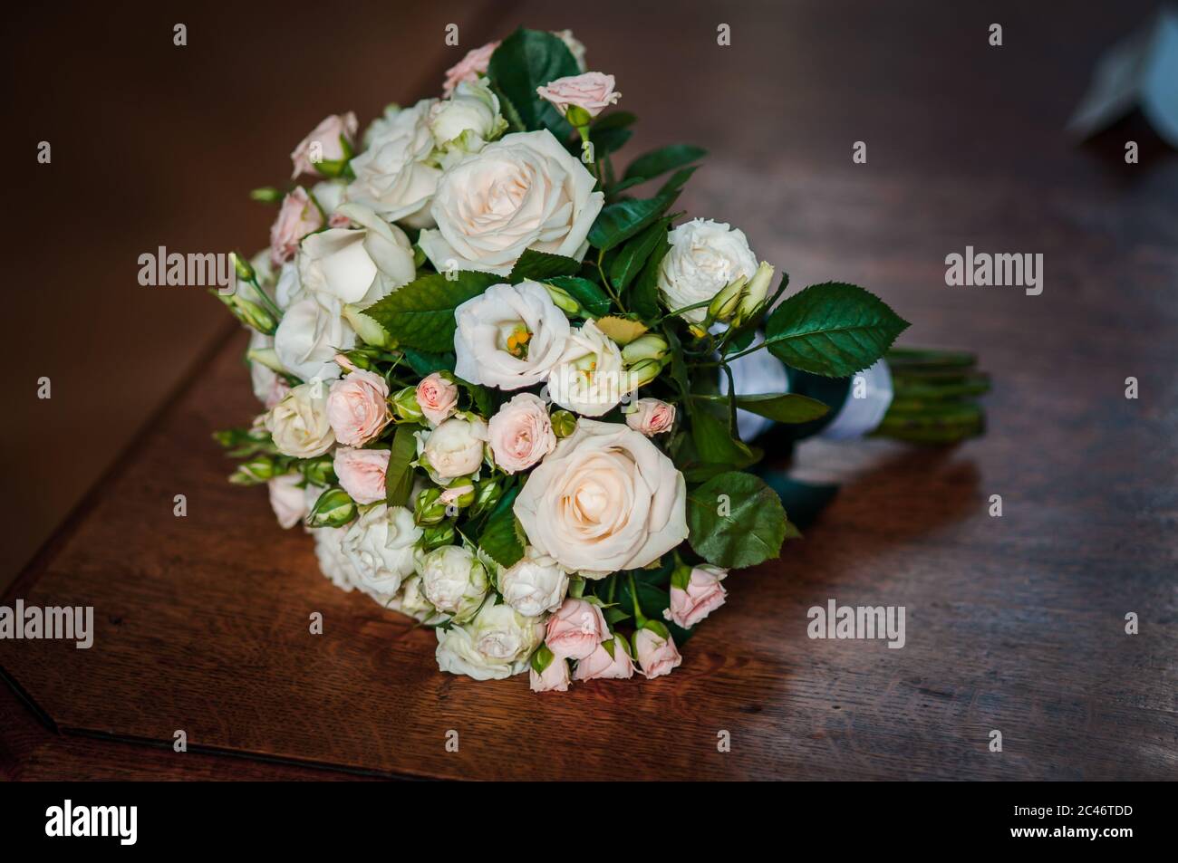 Colorfull bouquet of roses lying on the table Stock Photo