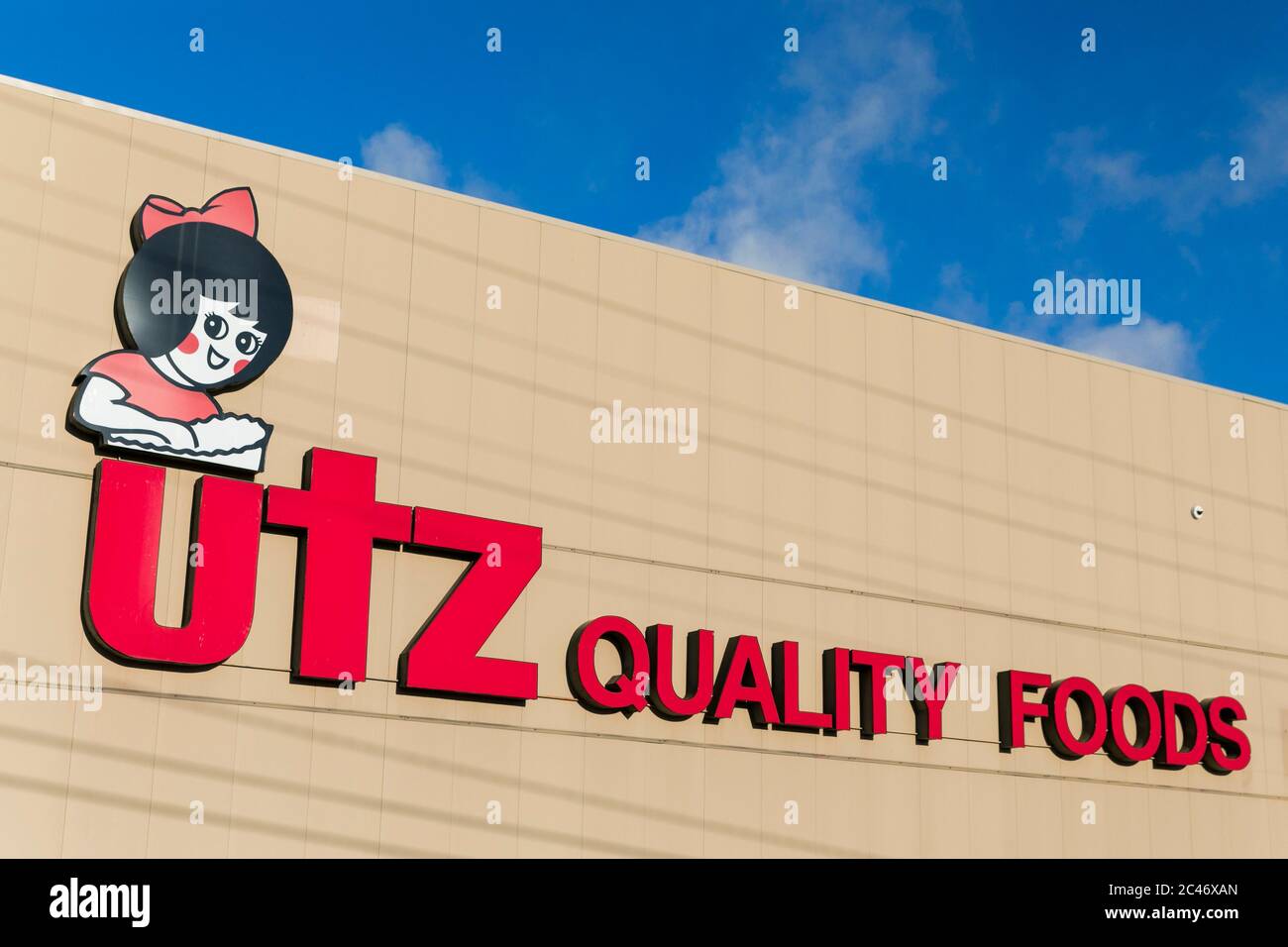 A logo sign outside of a facility occupied by Utz Quality Foods in Hanover, Pennsylvania on June 12, 2020. Stock Photo
