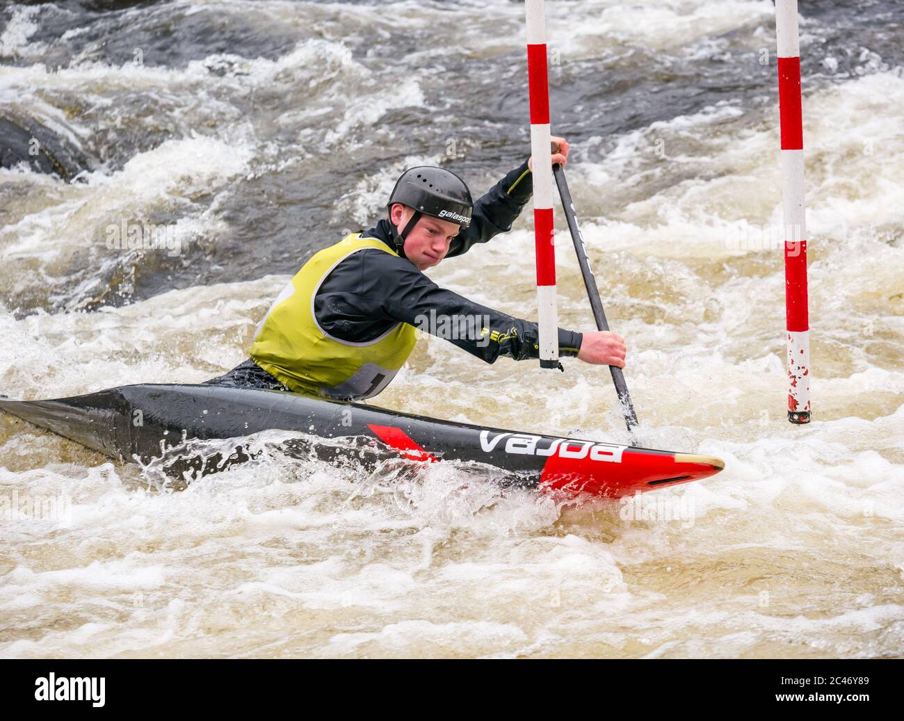 Premier Canoe Slalom: Robert Fernie of Holme Pierrepoint Canoe Club  competes in the C1 on the River Tay, Grandtully, Perthshire, Scotland, UK Stock Photo