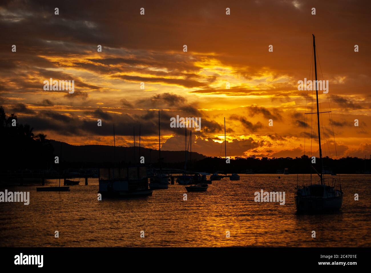 Sunrise over ocean boats hi-res stock photography and images - Alamy